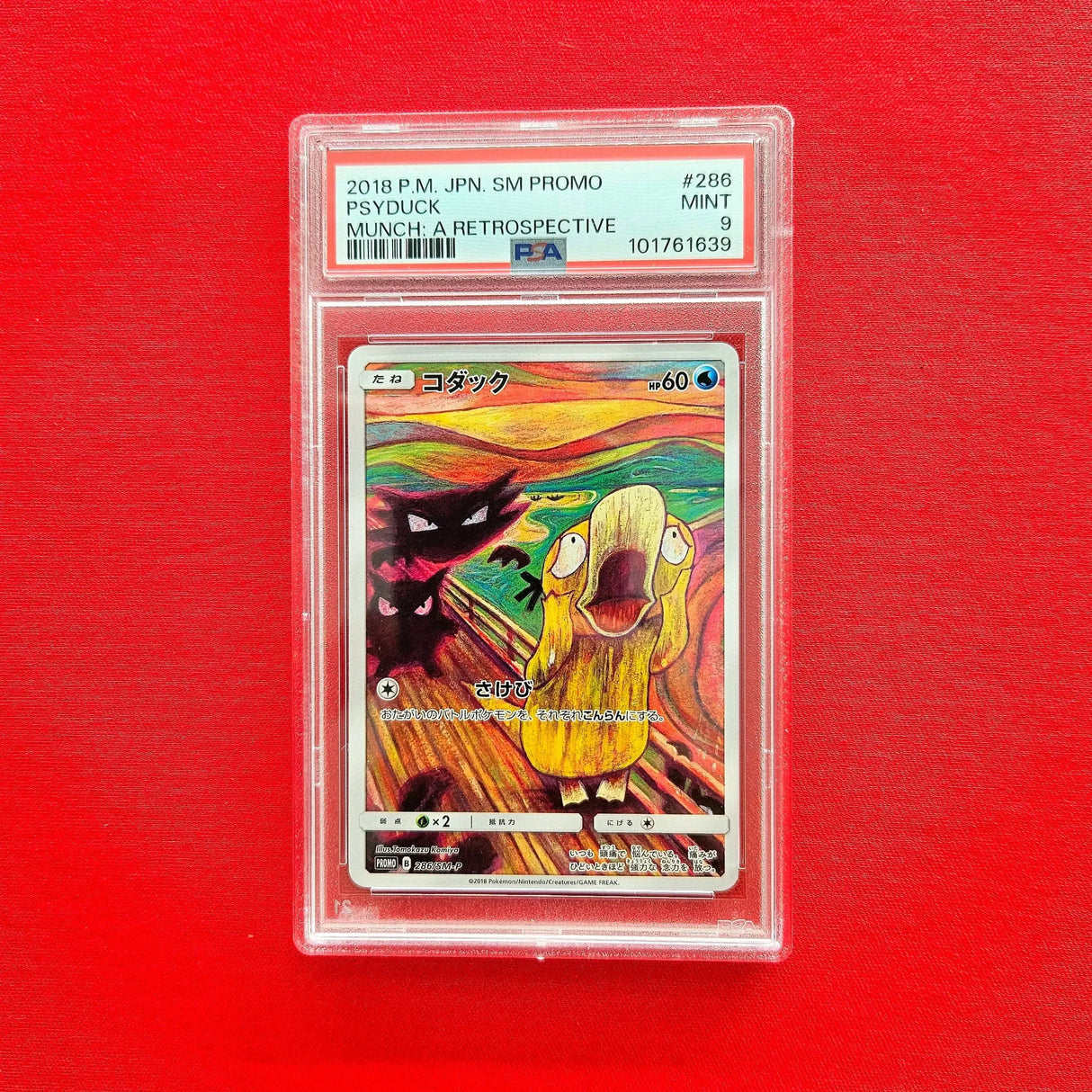 Pokémon TCG - Psyduck Munch Scream Promo Japanese 2018 (PSA 9) front