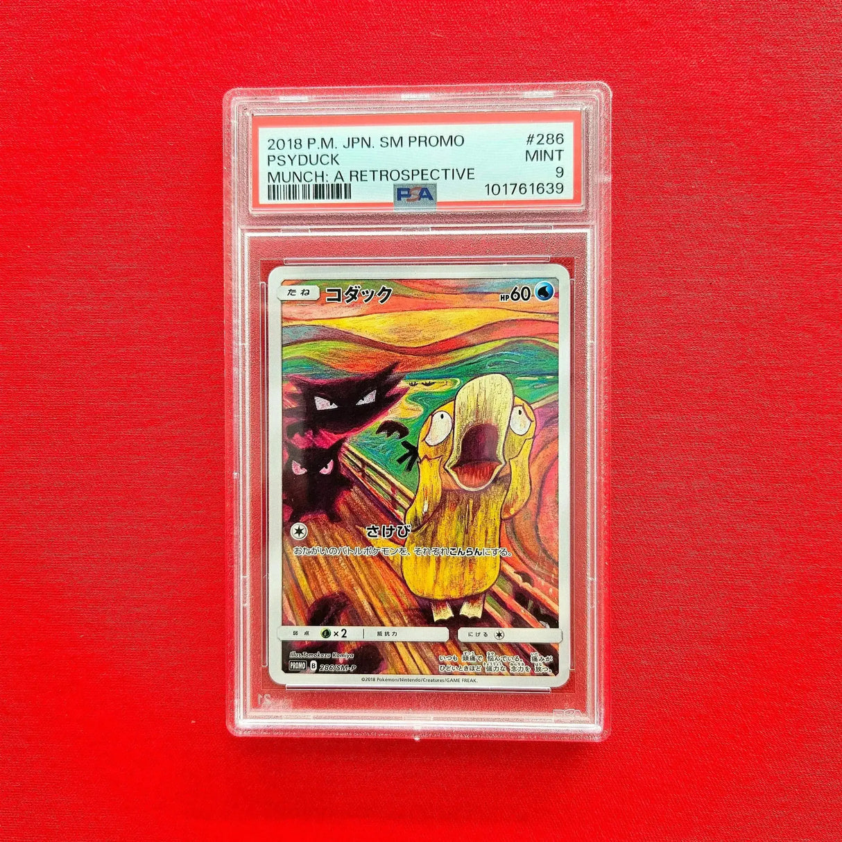 Pokémon TCG - Psyduck Munch Scream Promo Japanese 2018 (PSA 9) front